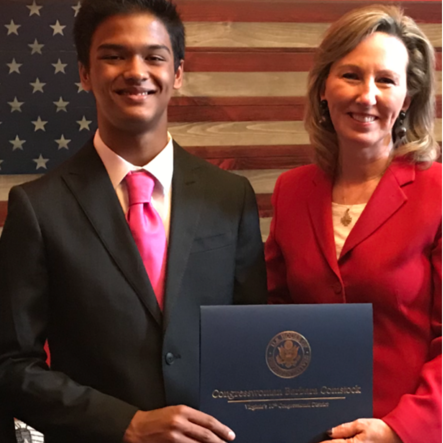 Sreyash Sola receiving award from Congress Woman Ms. Comstock